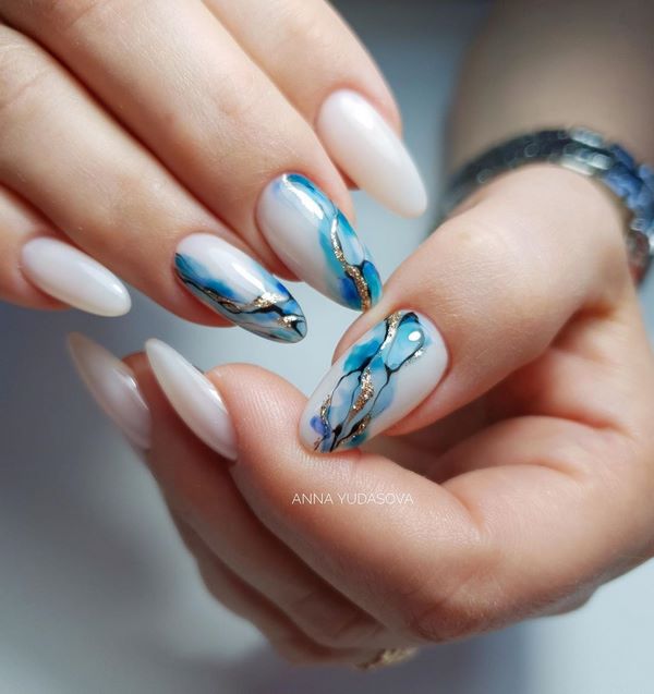 Menawan manicure lembut 2024-2025 - idea yang paling indah untuk reka bentuk lembut marigolds